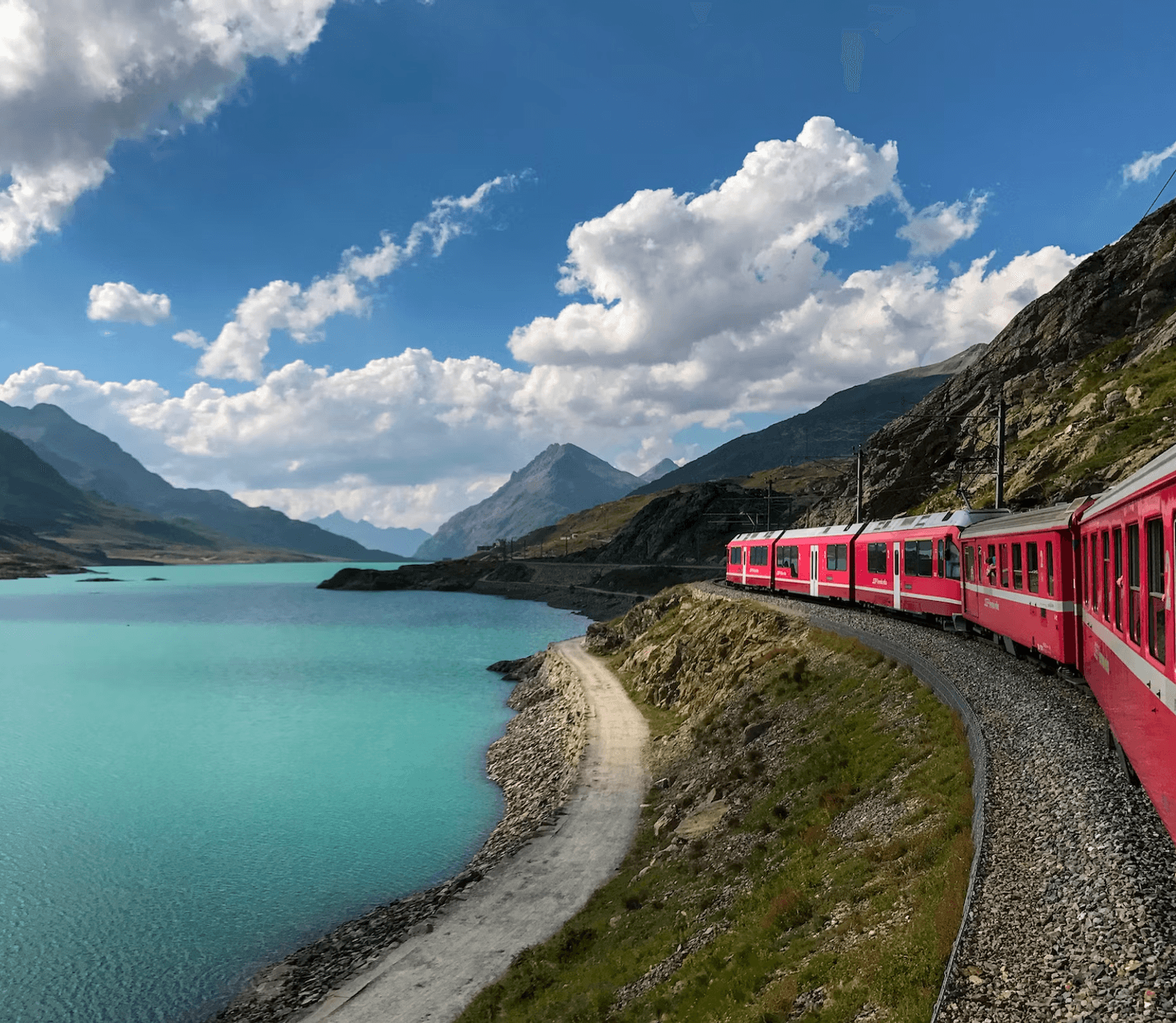Lake with red train on the right side